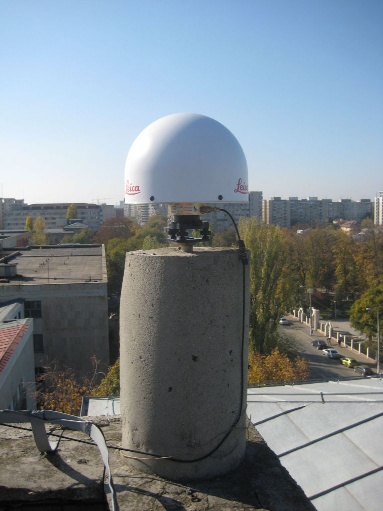 GNSS antenna and concrete pillar on the roof of the building of the Technical University of Civil Engineering Bucharest, Faculty of Geodesy.
