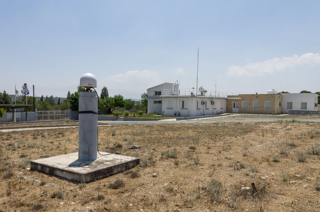 GNSS Antenna LEIAR25, pillar and the building of the Meteorological Radiosonde Station in Nicosia-Athalassa. 	