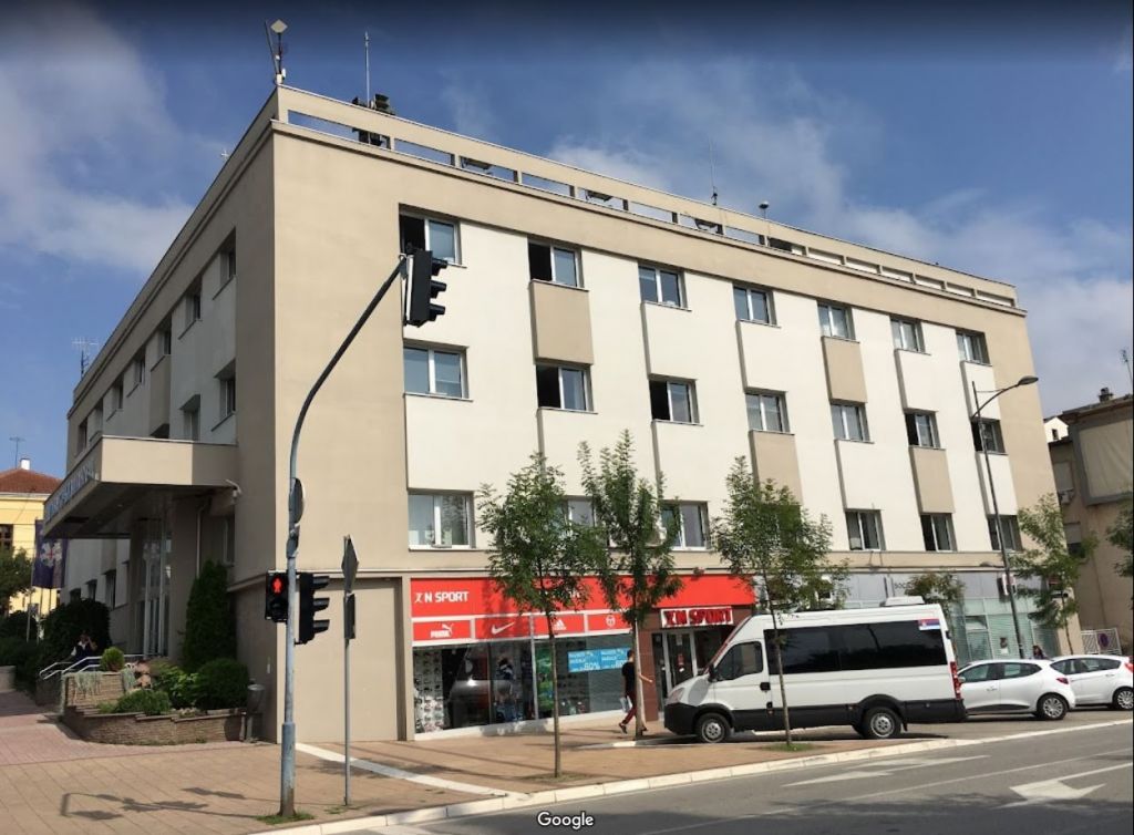 The municipality building of Gornji Milanovac where the local office of real estate cadastre service is situated. On the building roof it is noticeable TRM115000.00 GNSS antenna with TZGD dome placed on iron pillar.