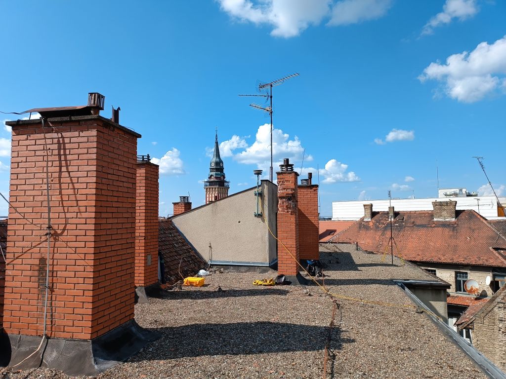 The wide preview of GNSS antenna installation location on the roof of local cadaster office in Subotica municipality.
